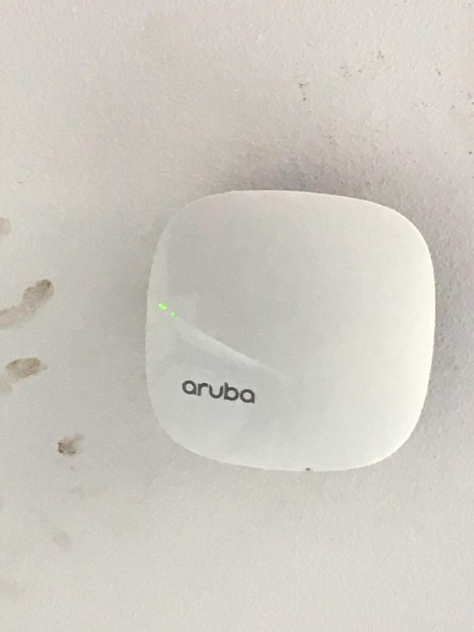 Ceiling-mounted business Wi-Fi access point installed by IT Guy Solutions